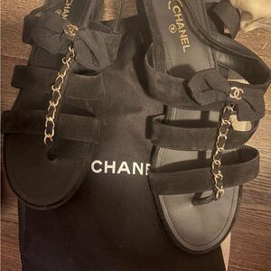 CHANEL Black Sandals with Bow and Chain Accent